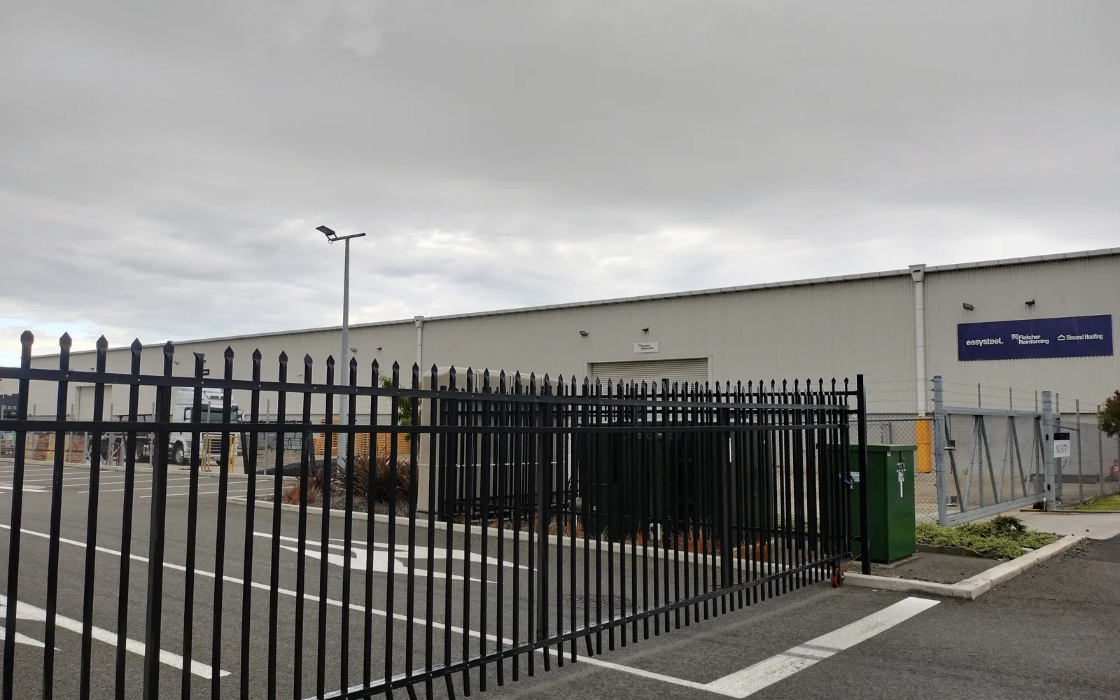 Industrial warehouse building with corrugated metal siding