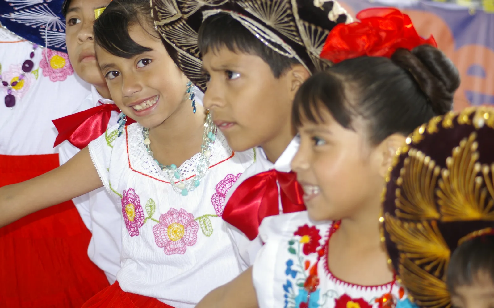 Festive community celebration with colorful decorations and crowds